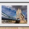 Tower Bridge dominates this view over the River Thames, its stone towers
