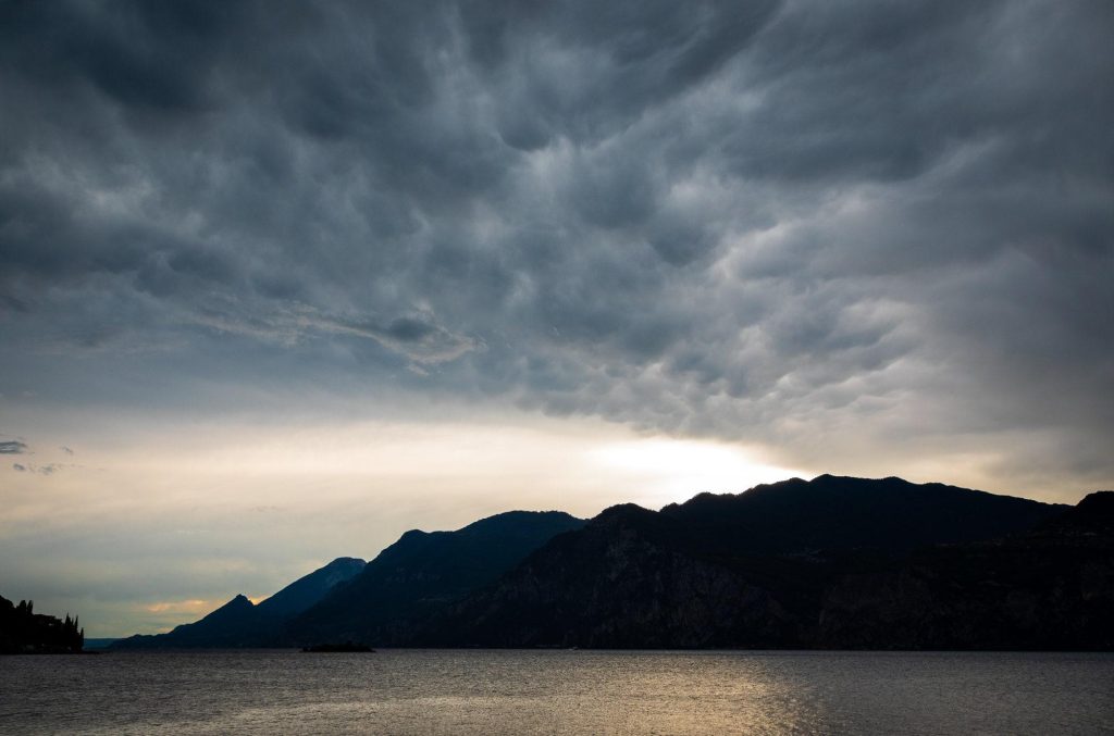 Storm clouds gather over Lake Garda in this atmospheric view from Malcesine, Italy – view 2