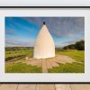 White Nancy stands above Bollington and Rainow on Kerridge Ridge, Peak District