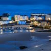 Tenby Harbour settles into the blue hour after sunset, Wales