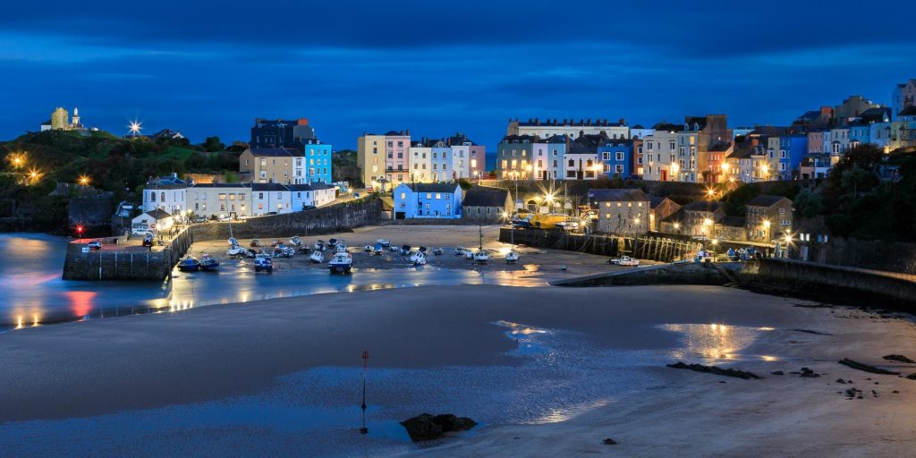 Tenby Harbour settles into the blue hour after sunset, Wales