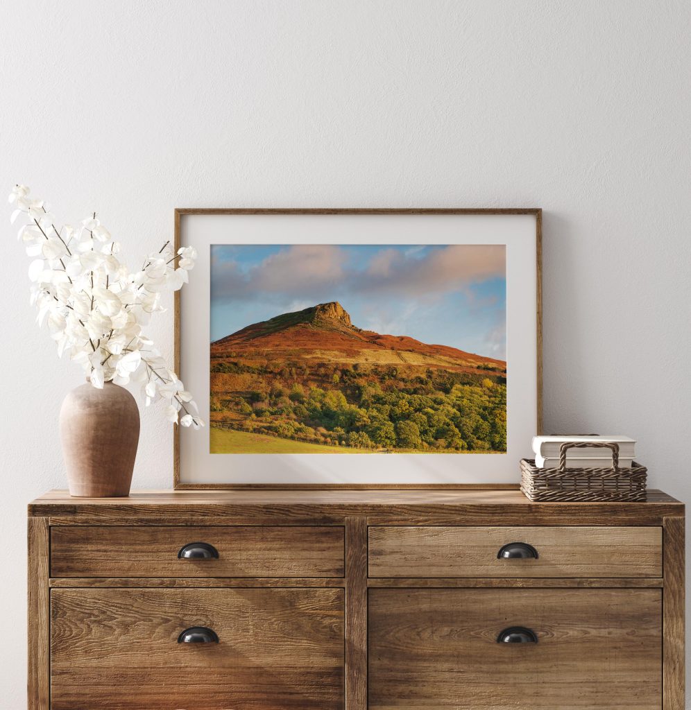 Roseberry Topping rises above the North York Moors in a rich autumn landscape of russet heather, bracken, Yorkshire – view 6