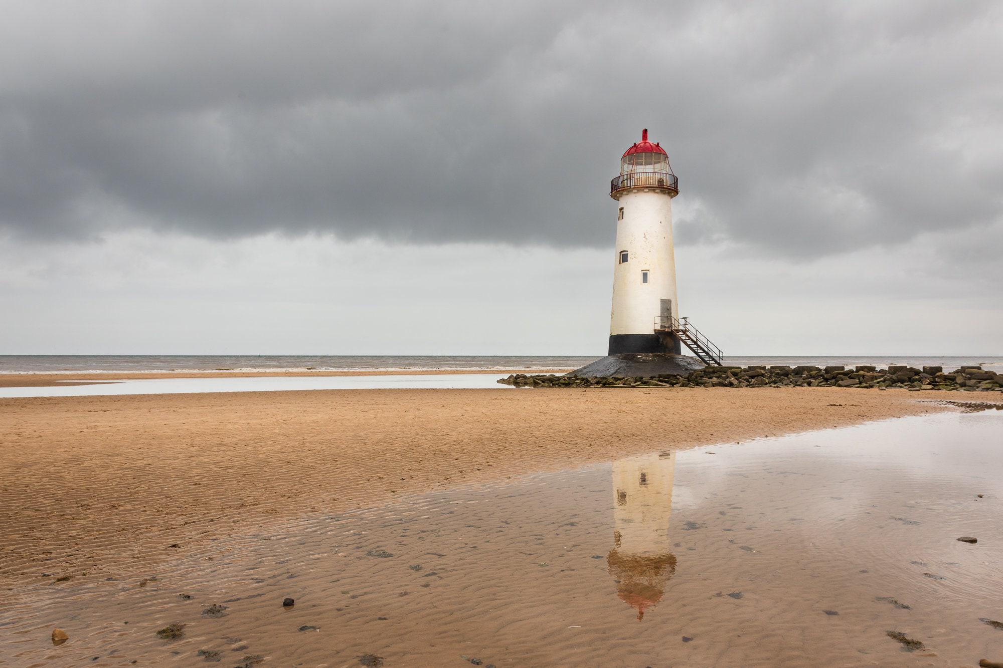Talacre Lighthouse rises from the shoreline at Point of Ayr, North Wales – view 2