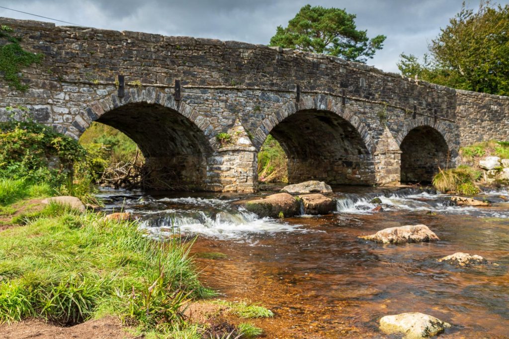 The ancient stone bridge at Postbridge spans the East Dart River in the centre of Dartmoor – view 2