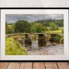 The historic clapper bridge at Postbridge crosses the East Dart River in the heart of Dartmoor