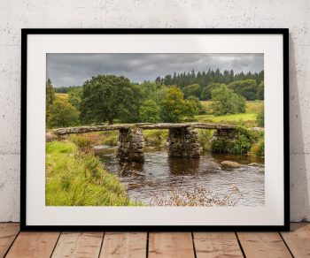 The historic clapper bridge at Postbridge crosses the East Dart River in the heart of Dartmoor