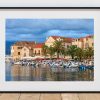 Postira’s waterfront rests in evening light on the Croatian island of Brac, Croatia