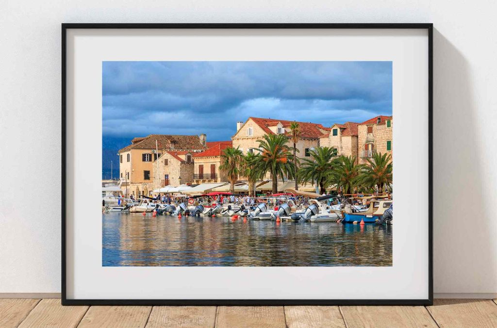 Postira’s waterfront rests in evening light on the Croatian island of Brac, Croatia