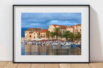Postira’s waterfront rests in evening light on the Croatian island of Brac, Croatia