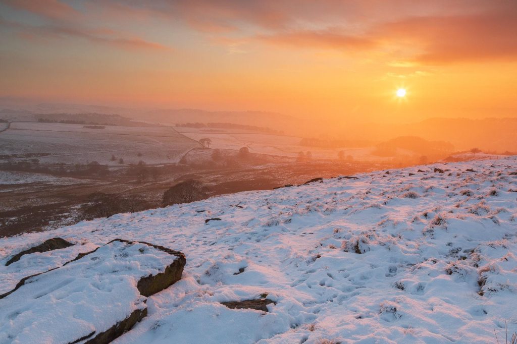 The winter sun hangs low over Bakestonedale Moor, Peak District – view 2
