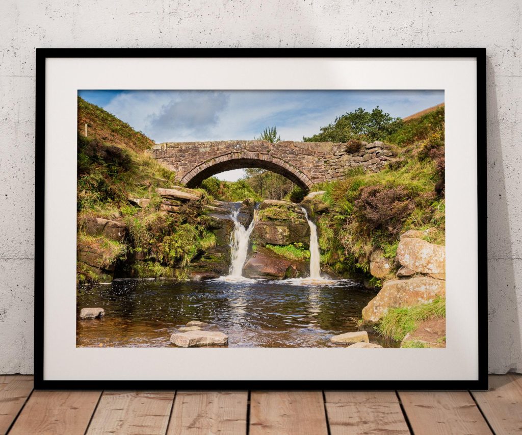 At Three Shires Head, the River Dane gathers beneath the old packhorse bridge before spilling into Panniers Pool