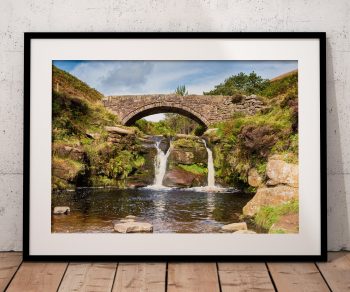 At Three Shires Head, the River Dane gathers beneath the old packhorse bridge before spilling into Panniers Pool