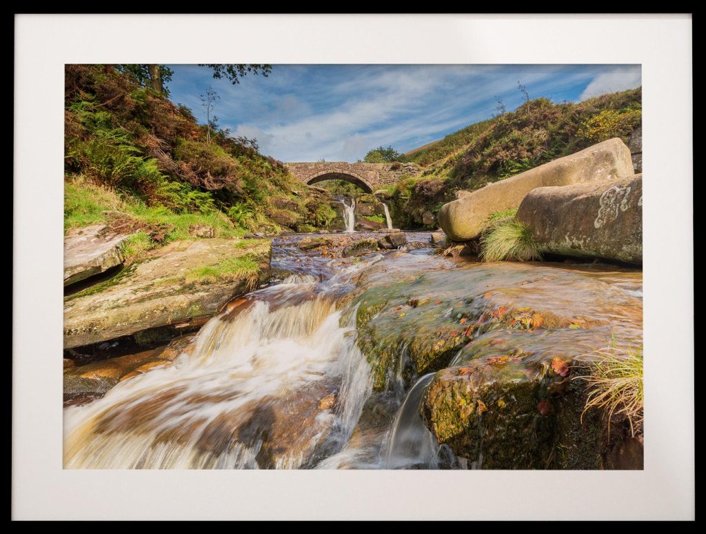 Water rushes over the rocks of the River Dane at Three Shires Head, Peak District – view 6