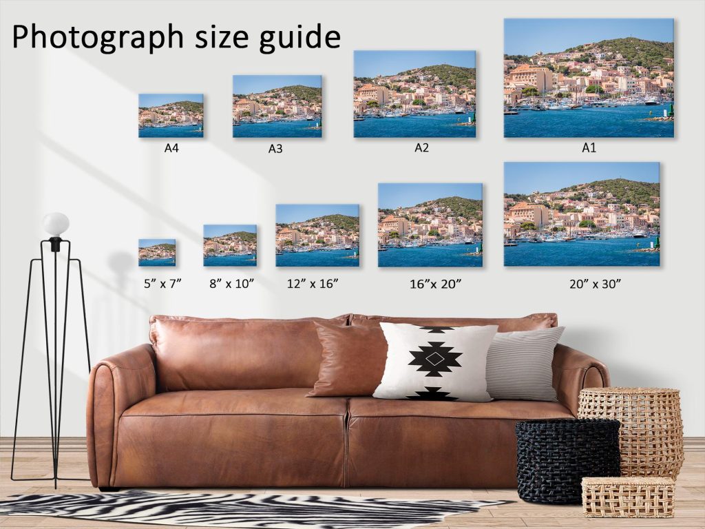 The harbour of La Maddalena is filled with boats in this bright coastal view of the town on the island of Maddalena – view 3