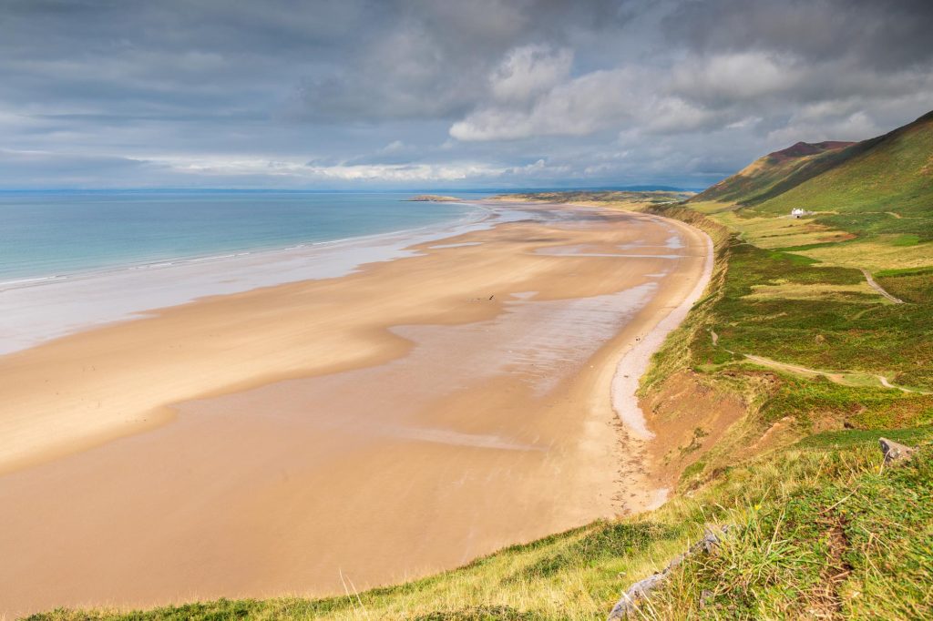 Rhossili Bay opens out in a wide sweep of sand along the Gower Peninsula – view 2