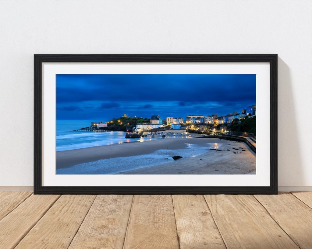 Tenby Harbour is captured here during the blue hour after sunset, Wales