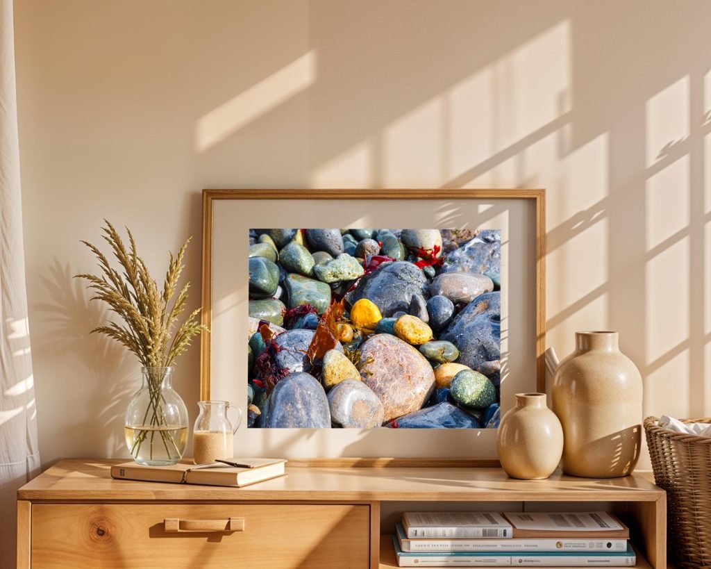Rounded beach pebbles, polished by the sea, fill this close-up coastal photograph with colour and texture, Wales – view 5