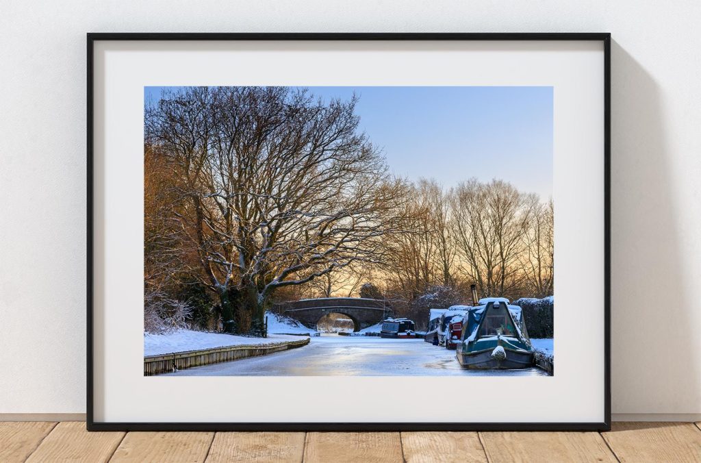 Snow transforms the Macclesfield Canal near Bollington into a quiet winter landscape, Peak District