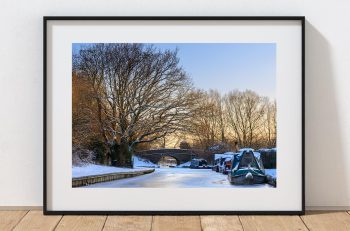 Snow transforms the Macclesfield Canal near Bollington into a quiet winter landscape, Peak District