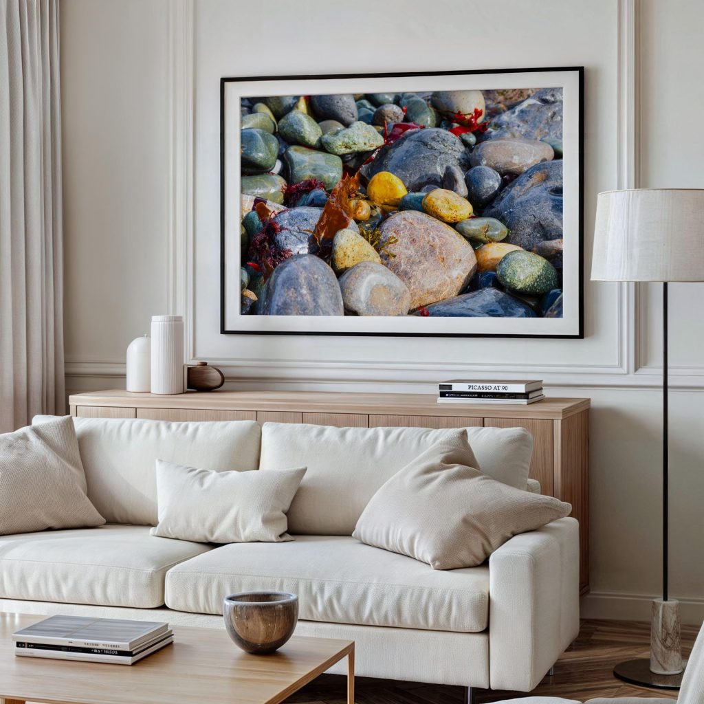 Rounded beach pebbles, polished by the sea, fill this close-up coastal photograph with colour and texture, Wales – view 4