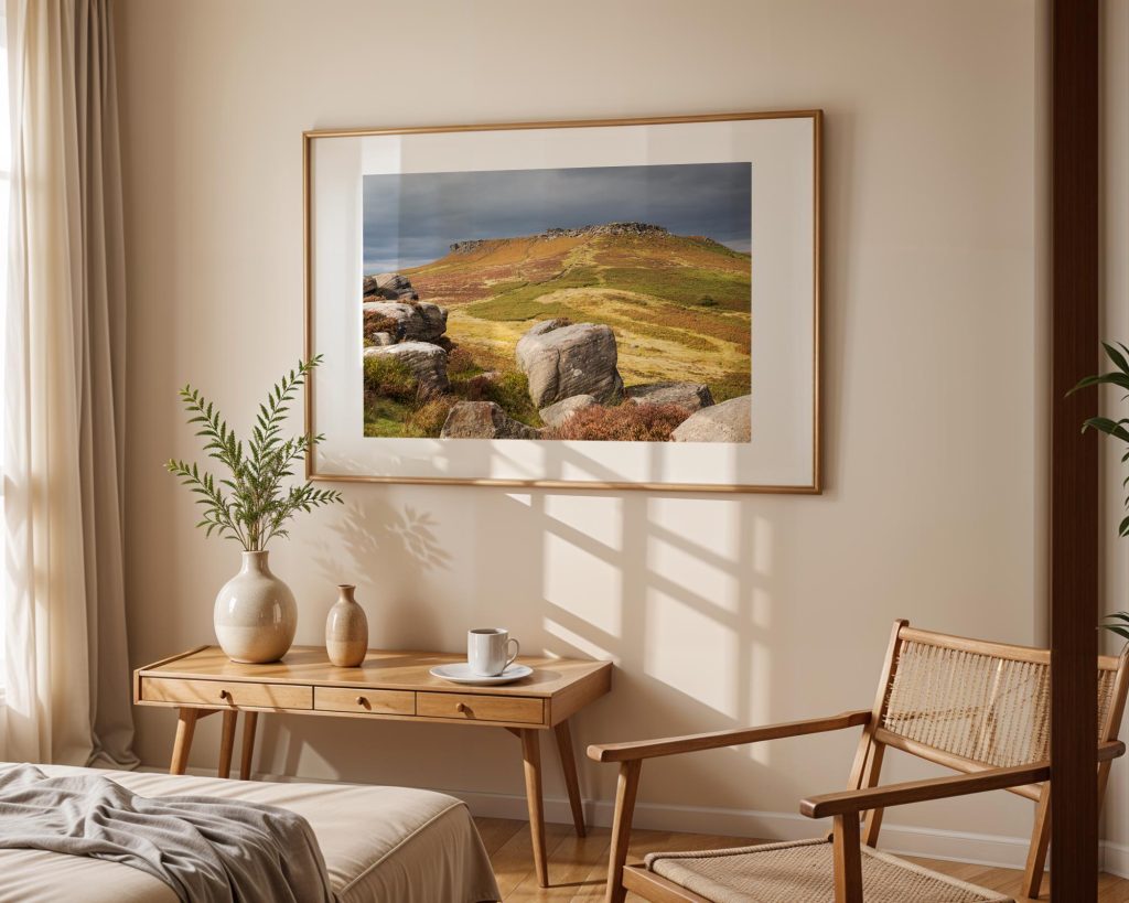 Autumn sunlight breaks across the moors above Hathersage, Peak District – view 3
