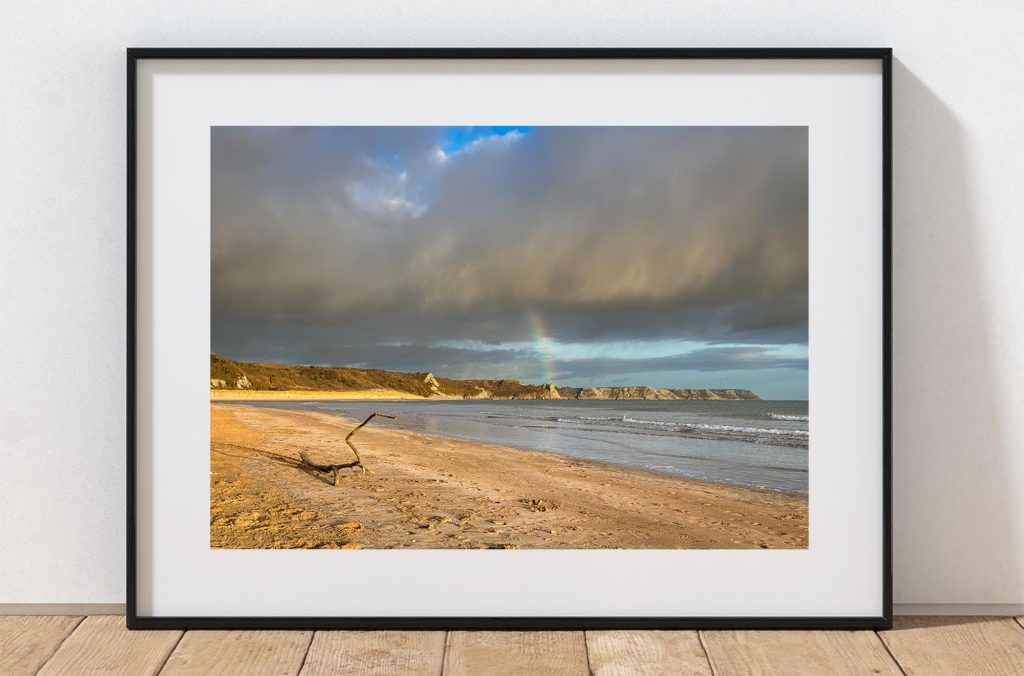 Oxwich Bay stretches across the Gower Peninsula in this atmospheric coastal photograph