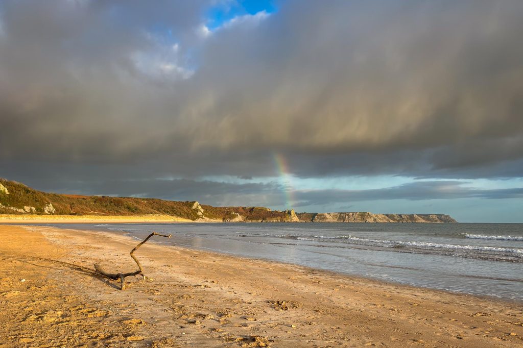 Oxwich Bay stretches across the Gower Peninsula in this atmospheric coastal photograph – view 2