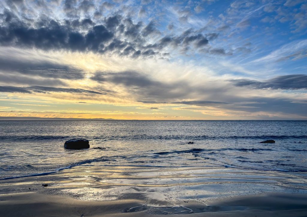 The sun settles over the Bristol Channel near Nash Point and Marcross, Wales – view 2